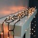 Гирлянда-нить (String-Lights) 100WW-3 внутренняя, с чёрным проводом, 7м (Цвет: белый-теплый) DP-11868 фото 2
